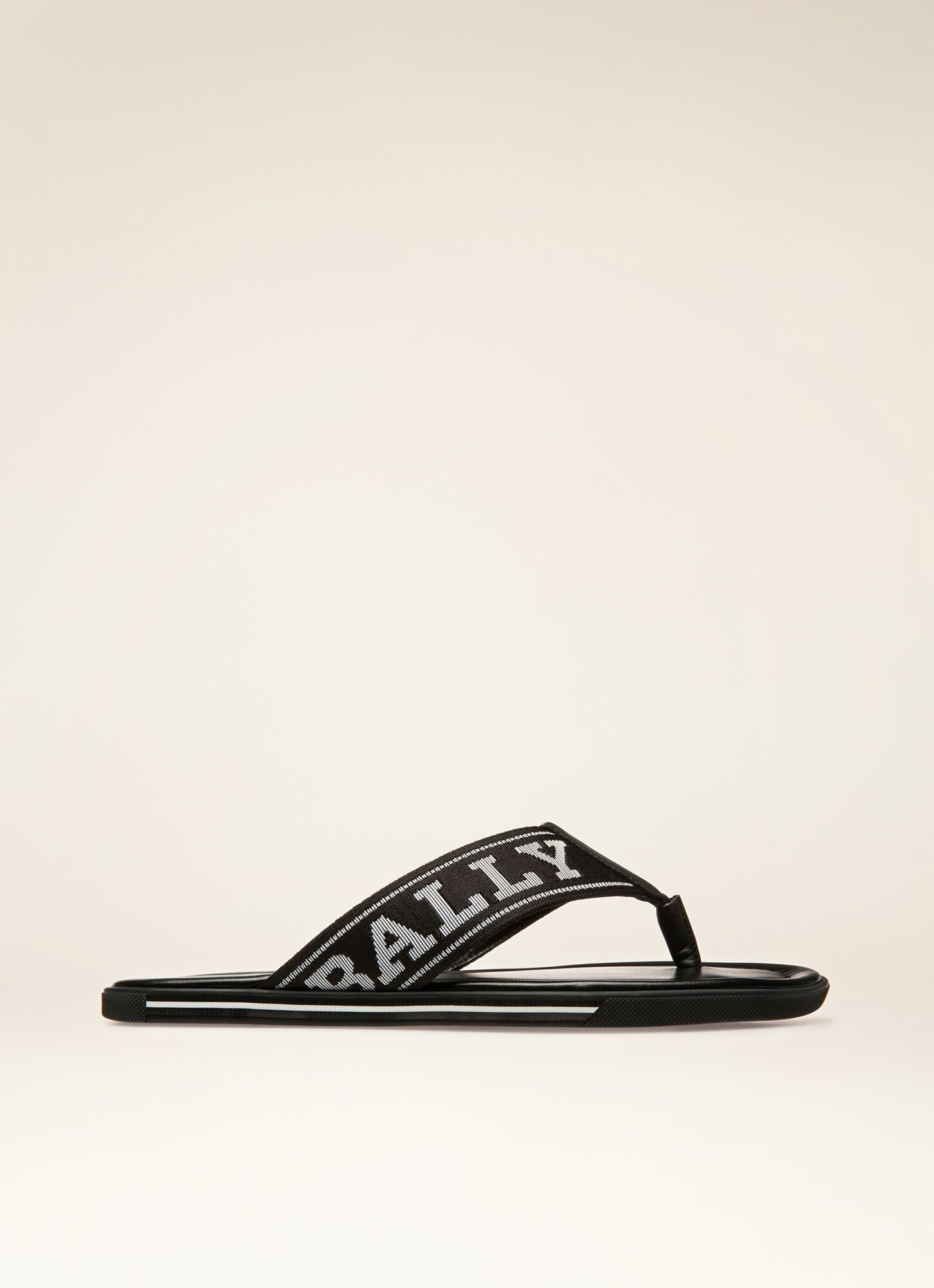 black fabric flip flops