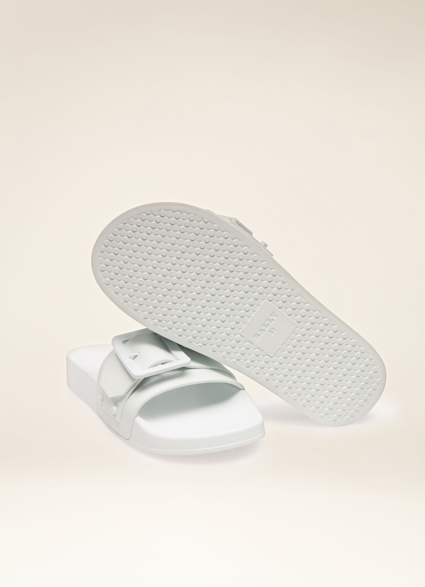 white rubber slip on flip flops